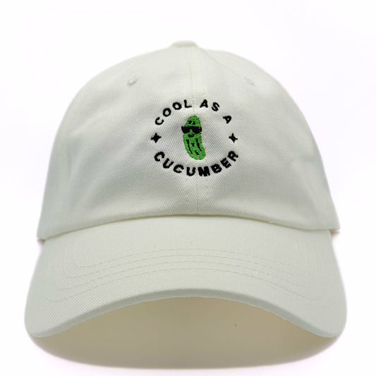 White cap with 'Cool as a Cucumber' text and graphic on a white background