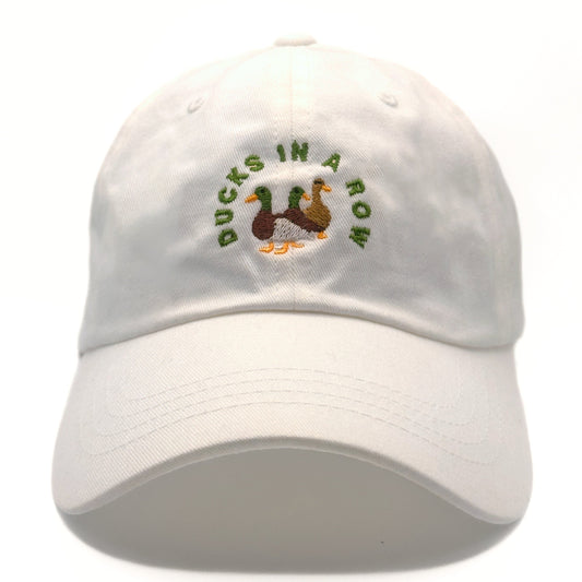 White cap with 'Ducks in a Row' logo on a white background